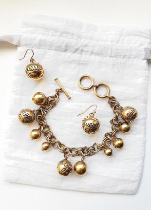 Оригинальный набор от guess: золотой браслет и серьги