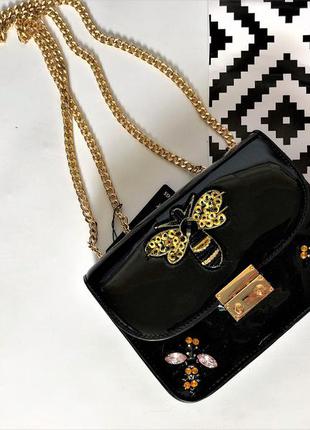 Сумка - клатч є рожева,чорна,червона