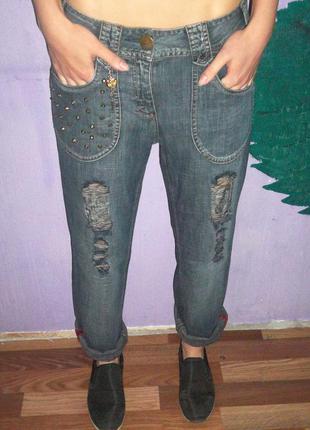 Рваные джинсы по типу бойфренд cecil с шипами1 фото