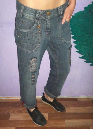 Рвані джинси за типом бойфренд cecil з шипами2 фото