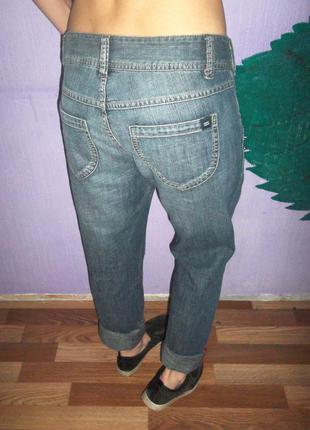 Рваные джинсы по типу бойфренд cecil с шипами5 фото