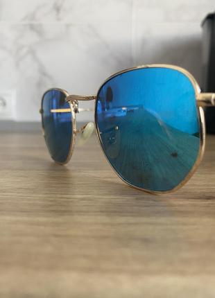 Синие зеркальные круглые очки с поляризацией в золотистой оправе7 фото
