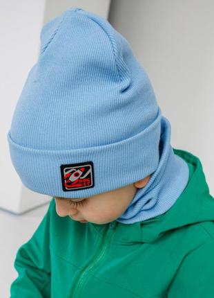 Комплект (шапка хомут) блакитного кольору на весну-осінь1 фото