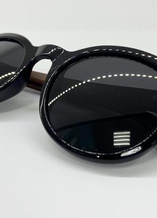 Солнцезащитные круглые очки поляризованные в пластиковой оправе с деревянными дужками5 фото