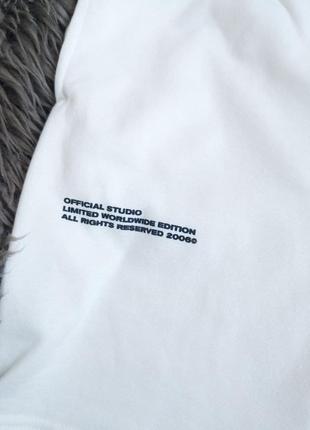 Белые теплые шорты двунитка на флисе с надписью2 фото