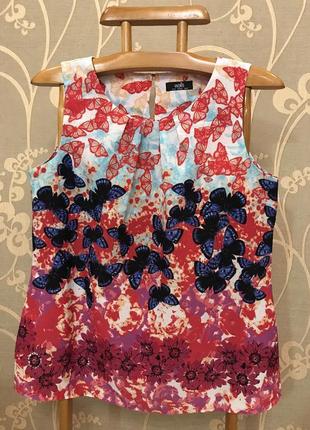 Дуже гарна і стильна брендовий блузка в метеликах 20.