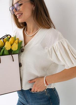 Блуза укороченная с коротким рукавом.6 фото