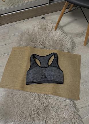 Спортивний топ від secret possessions