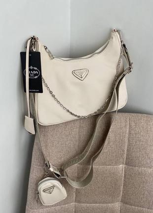 Женская сумка в стиле prada re-edition beige.женская сумочка с длинной ручкой7 фото