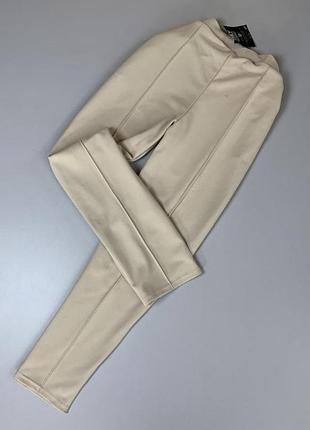Штани бежеві