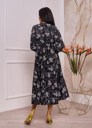 Чорна класична сукня з рукавами-ліхтариками3 фото