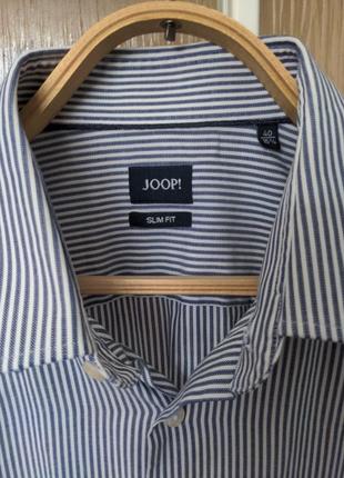 Нарядная рубашка от известного бренда.2 фото