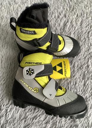 Скандинавські лижні черевики fischer snowstar junior1 фото