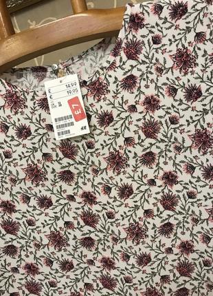Очень красивая и стильная брендовая блузка в цветочках..100% вискоза 21.8 фото