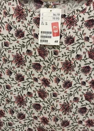 Очень красивая и стильная брендовая блузка в цветочках..100% вискоза 21.6 фото