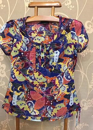 Очень красивая и стильная брендовая разноцветная блузка..100% коттон.