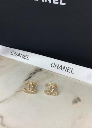 Стильні брендові сережки гвоздики золотого кольору2 фото