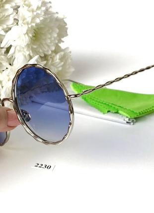 Стильні сонцезахисні окуляри з синіми лінзами к. 22302 фото