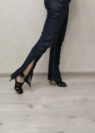 Джинси жіночі. оригінальні джинси із розрізами по боках1 фото