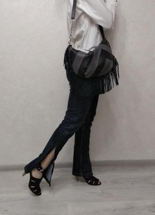Джинси жіночі. оригінальні джинси із розрізами по боках4 фото