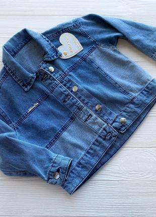 Куртка джинсовая на девочку синего цвета1 фото