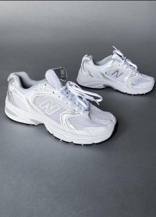 Стильні трендові кросівки new balance білі сріблисті жіночі підліткові дитячі 36-402 фото