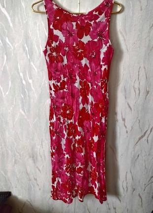 Красивейшее платье,хорошо подчеркивающее фигуру, с цветочным принтом и обалденным декольте  производство румыния3 фото
