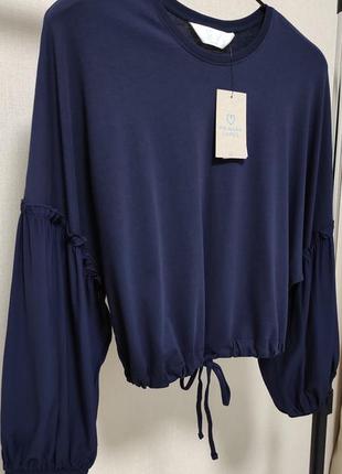 Стильна блузка синього кольору з рукавів воланом primark
