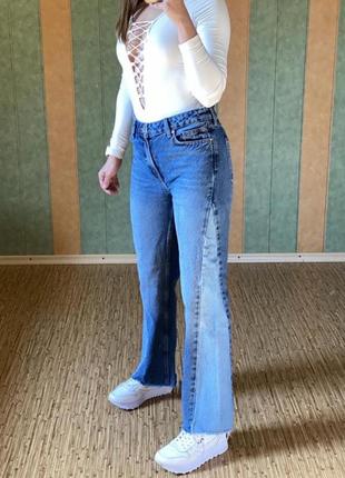 Круті джинси кльош з необробленим низом2 фото