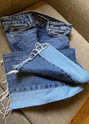 Круті джинси кльош з необробленим низом8 фото