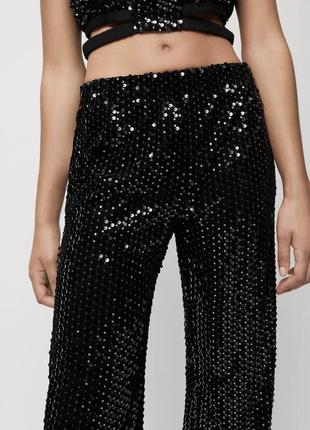 Костюм в паєтках спорт-шик