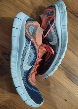 Бігові кросівки унісекс модель nike flycnit free run2 фото