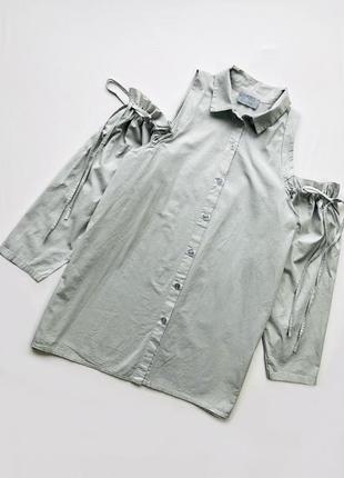 Стильна блузка з відкритими плечима. італія