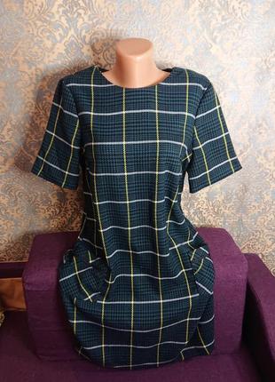 Женское трикотажное платье с карманами в клетку размер 44/464 фото