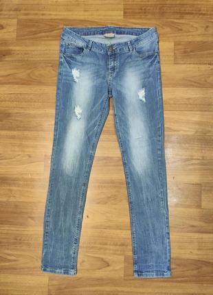 Skinny стрейчевые зауженные джинсы с потертостями