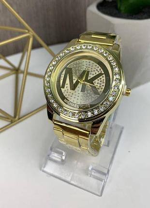 Жіночі наручні годинники з камінчиками