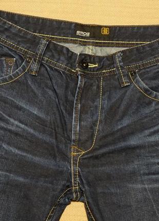 Вузькі сині фірмові джинси з выбеленностями і вытертостями smog німеччина 32/32 р.3 фото