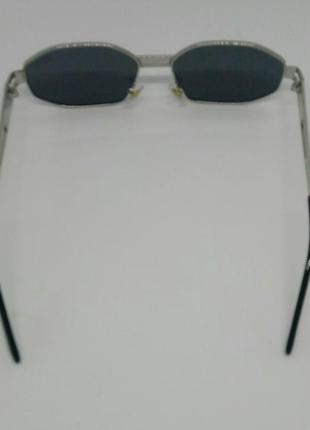 Christian dior очки унисекс солнцезащитные узкие чёрные в серебристом металле4 фото