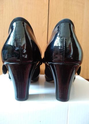 Брендовые кожаные черные 
 туфли, новые,р.39.3 фото
