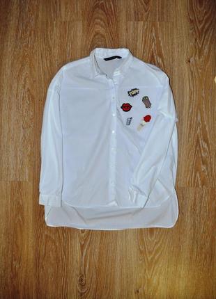 Белоснежная рубашка с яркими патчами от zara2 фото