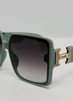 Женские солнцезащитные очки в стиле hermes серо зелёные с градиентом1 фото