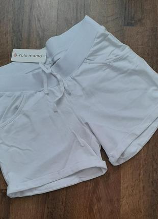 Білі вільні шорти для вагітних з поясом під живіт1 фото