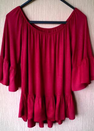 Актуальная трикотажная блуза с воланами