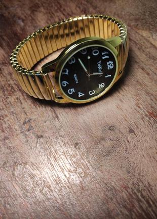 Часы кварцевые yaweisi big  на  браслете резинка под золото1 фото