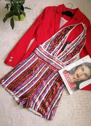 Яскравий ромпер в паєтку