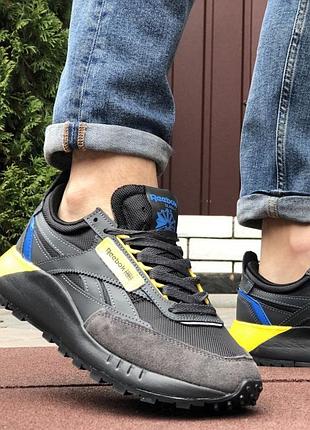 Чорні з жовтим чоловічі кросівки