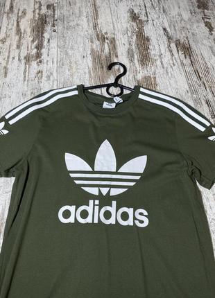 Женская футболка adidas с лампасами dri fit swoosh лосины4 фото