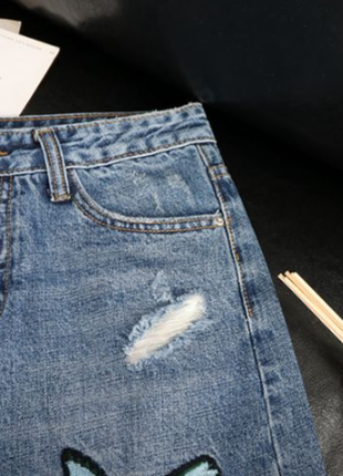 Нова трендова джинсова спідниця з вишивкою2 фото
