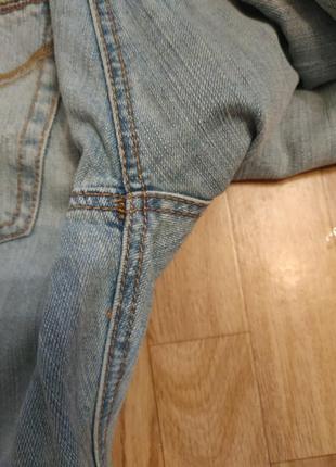 Голубые джинсы на болтах сигареты 33-34р.9 фото