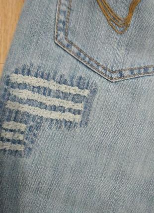Голубые джинсы на болтах сигареты 33-34р.8 фото